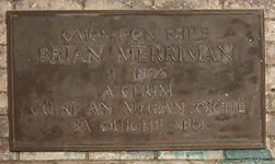 Sign about Brian Merriman on wall of Feakle graveyard